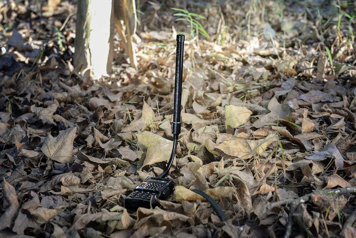 Airsoft or tactical field operator using a radio with the gooseneck antenna curved to fit comfortably under gear