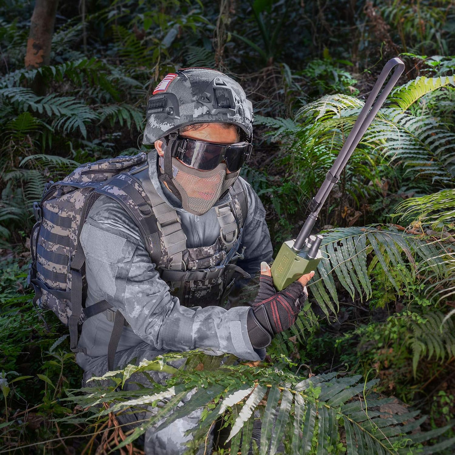 Outdoor use case, showing the antenna's long-range reception capability in a tactical or hiking setting