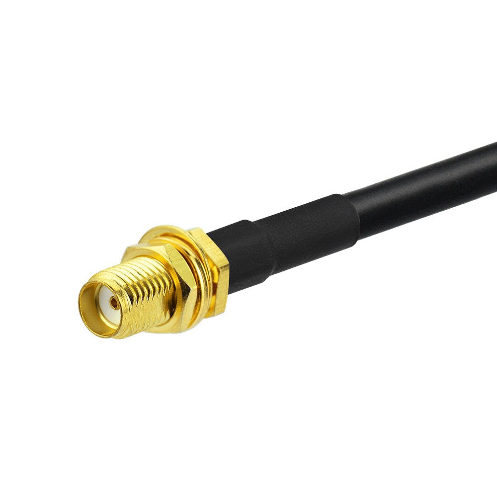 Clear view of the gold-plated SMA female (outer thread with hole) and the nickel-plated UHF SO239 female (large threaded socket) interfaces