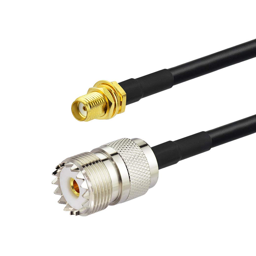 Clear view of the gold-plated SMA female (outer thread with hole) and the nickel-plated UHF SO239 female (large threaded socket) interfaces