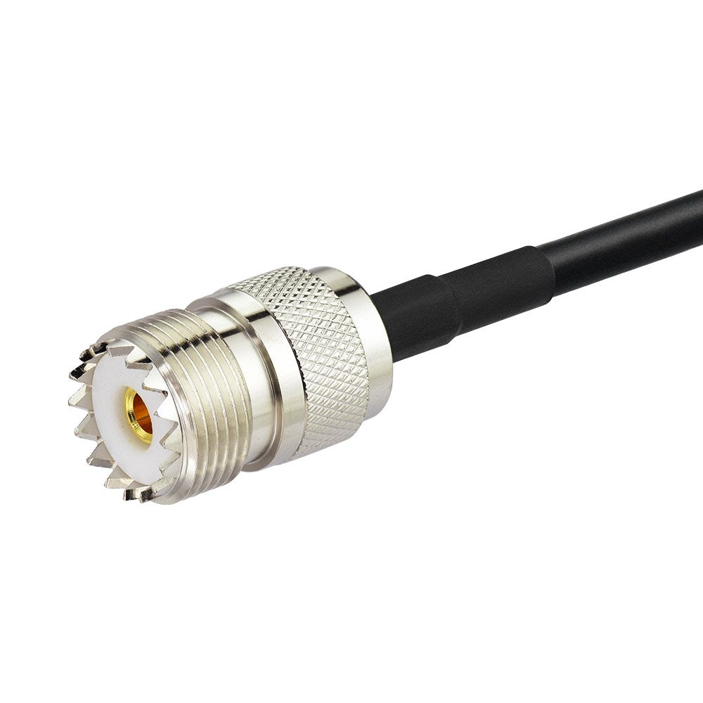 Clear view of the gold-plated SMA female (outer thread with hole) and the nickel-plated UHF SO239 female (large threaded socket) interfaces