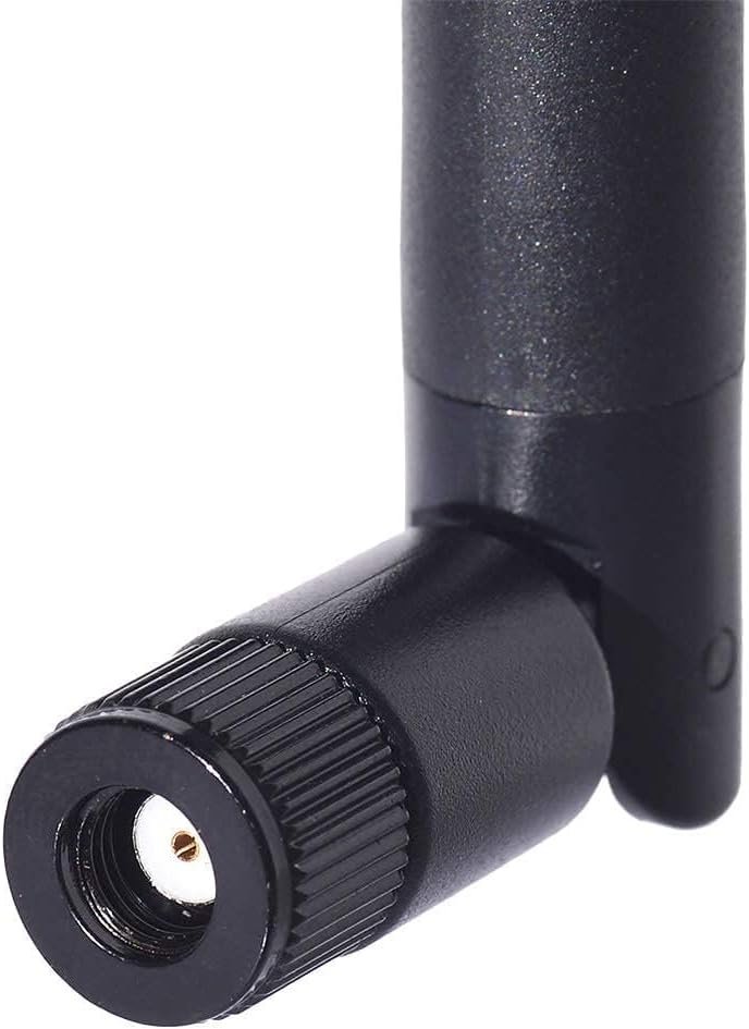 Macro view of the ultra-tiny MHF4 (IPEX4) connector used in modern Intel WiFi 6/6E cards vs. standard RP-SMA female