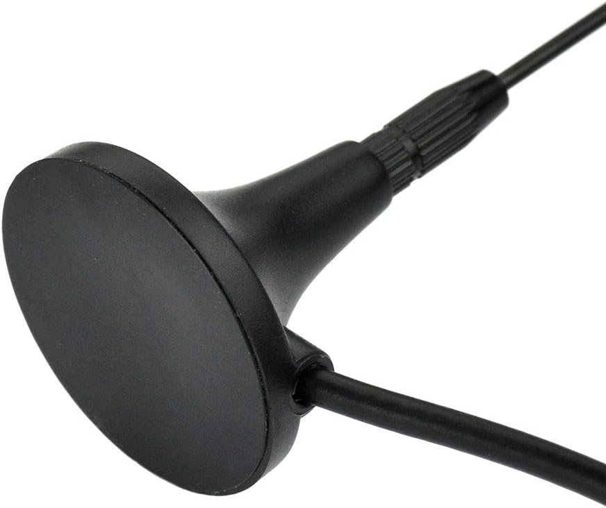 Simple setup showing the antenna placed on a vehicle roof and the 5m cable routed to an indoor DAB radio receiver