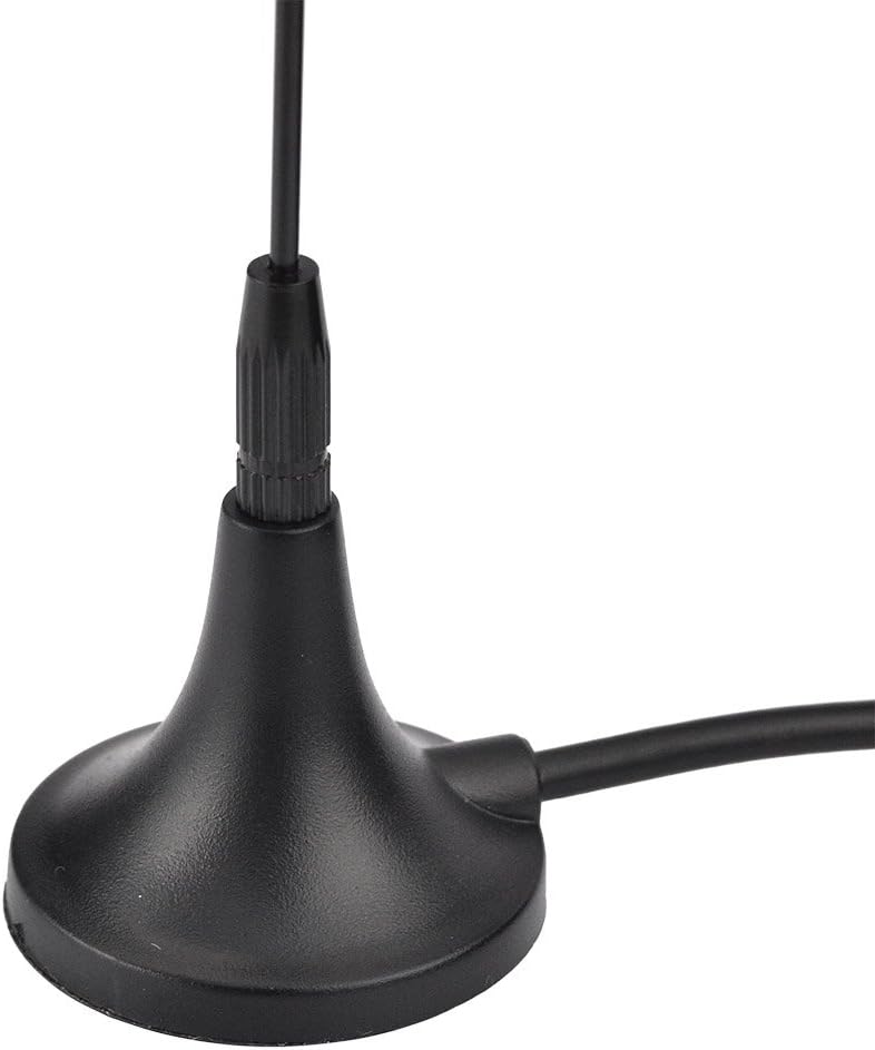 Simple setup showing the antenna placed on a vehicle roof and the 5m cable routed to an indoor DAB radio receiver