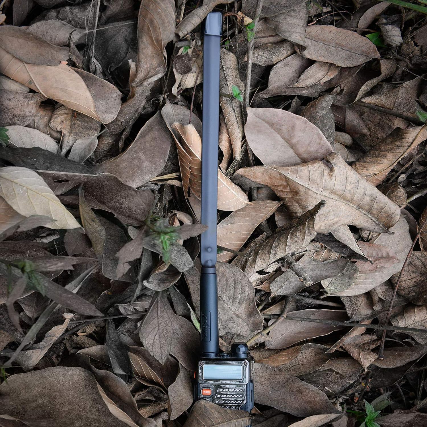Tactical antenna being used in outdoor settings (camping, hiking, or field operations) for reliable long-range comms