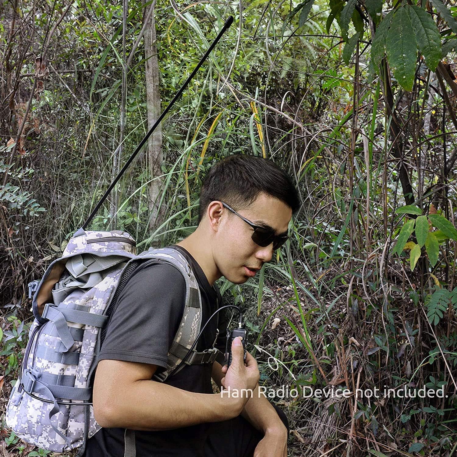 Tactical antenna used in field operations and outdoor survival, showing flexibility and extended range