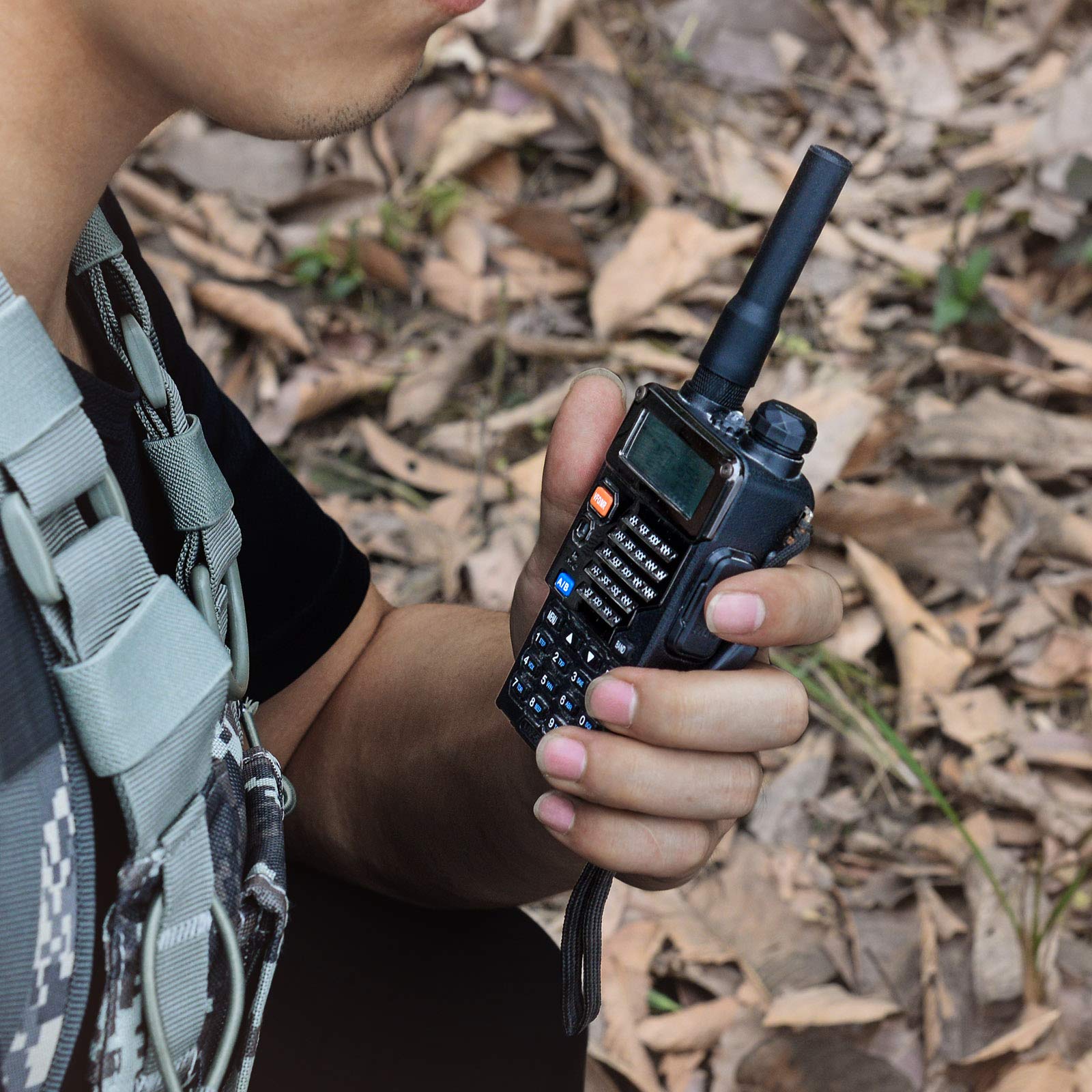 Using the Bingfu stubby antenna during security work and outdoor sports, showing how it stays out of the way on a belt-mounted radio